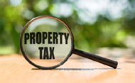 magnifying-glass-text-property-tax-260nw-1890921502-704f575c